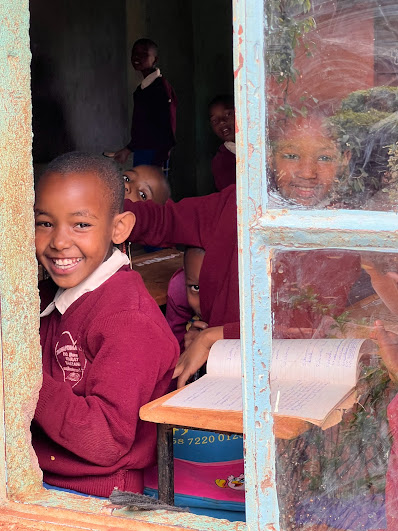 Smiling girl at window